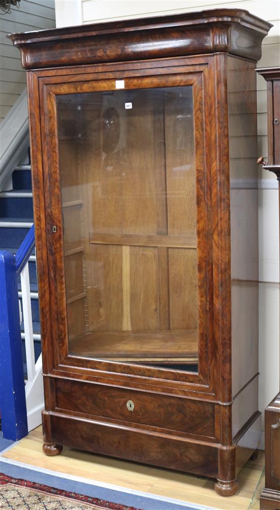 A mid 19th century French mahogany bookcase, enclosed by a glazed door W.99cm